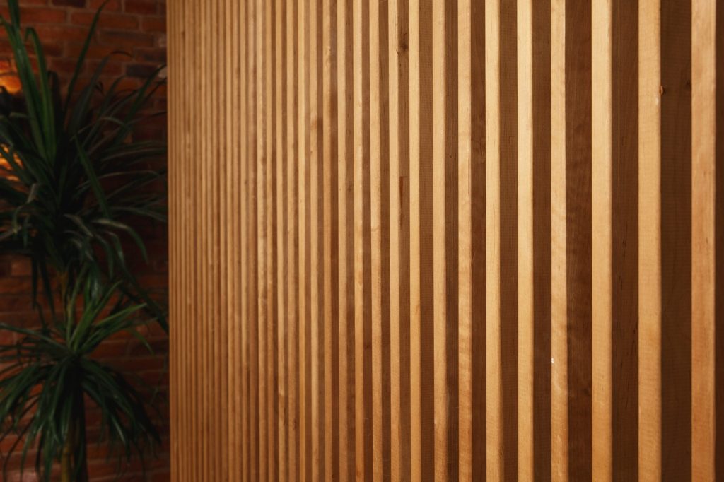 A vertical stack of wood cladding